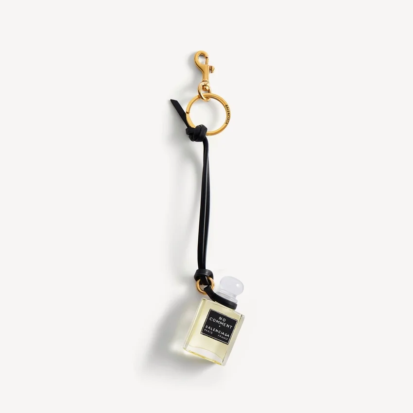 Fragrance miniature bottle charm in black Fragrance miniature bottle charm in black