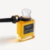 Fragrance miniature bottle charm in black