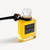 Fragrance miniature bottle charm in black