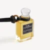 Fragrance miniature bottle charm in black
