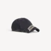 Men’s masking tape cap in faded black
