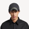 Men’s masking tape cap in faded black