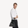Men’s shopper dust bag crossbody pouch medium in black Men’s shopper dust bag crossbody pouch medium in black