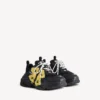 Women’s triple s tape type sneaker in black/yellow