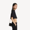 Women’s hourglass phone pouch in black Women’s hourglass phone pouch in black