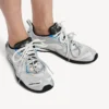 Women’s radar gradient lines sneaker in white/grey/silver/black/blue
