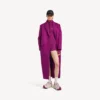 Women’s techwear short long sleeve bodysuit in violet/orange